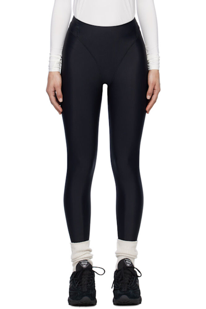 Черные длинные спортивные леггинсы с карманами District Vision
Черные длинные спортивные леггинсы с карманами District Vision