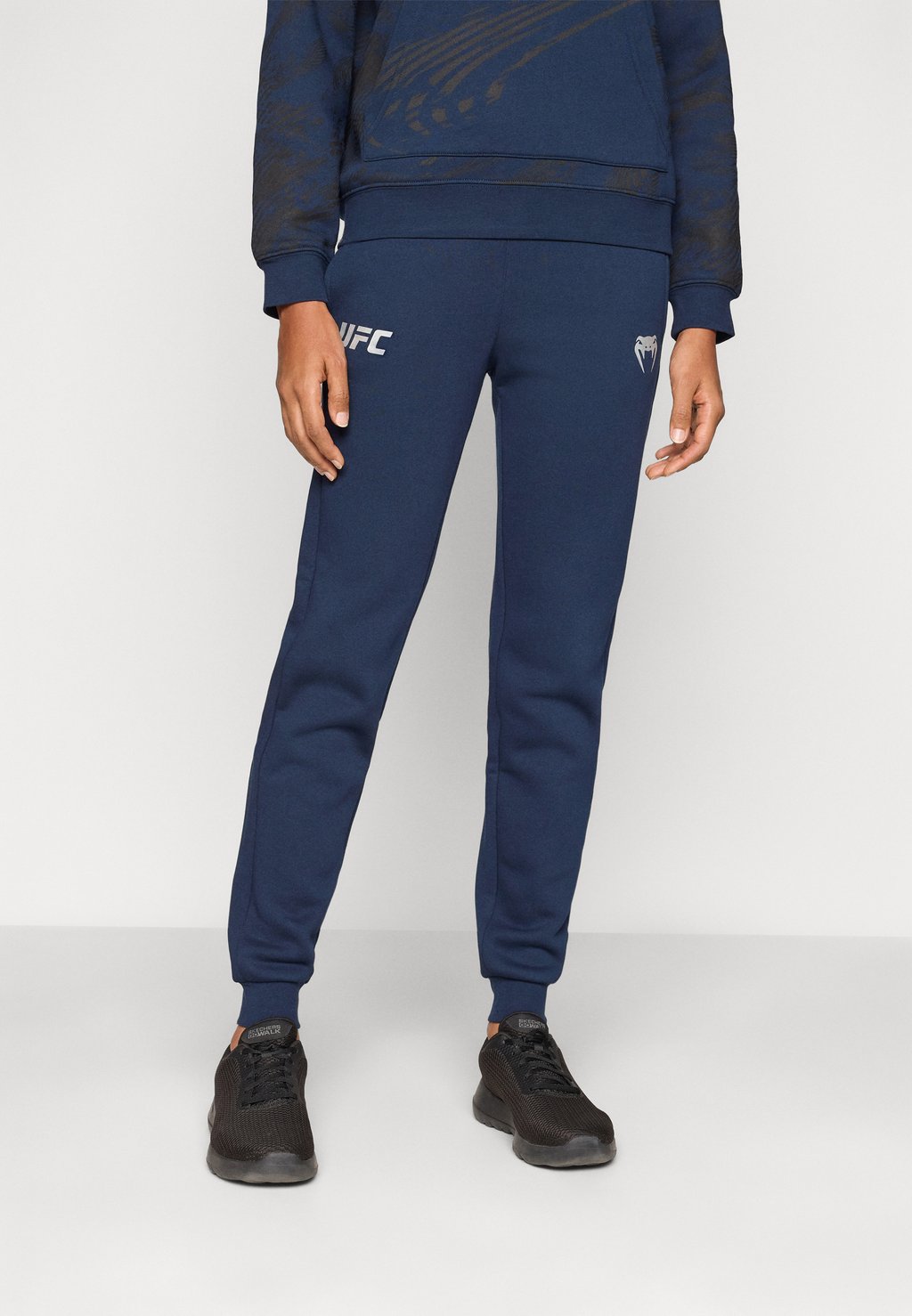 Спортивные штаны UFC FUSION FIGHT WEEK WOMENS PANT Venum, темно-синий
Спортивные штаны UFC FUSION FIGHT WEEK WOMENS PANT Venum, темно-синий