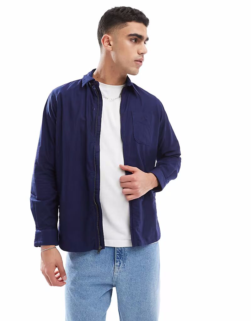 Рубашка-оксфорд с логотипом Polo Ralph Lauren и молнией спереди, темно-синего цвета
Рубашка-оксфорд с логотипом Polo Ralph Lauren и молнией спереди, темно-синего цвета