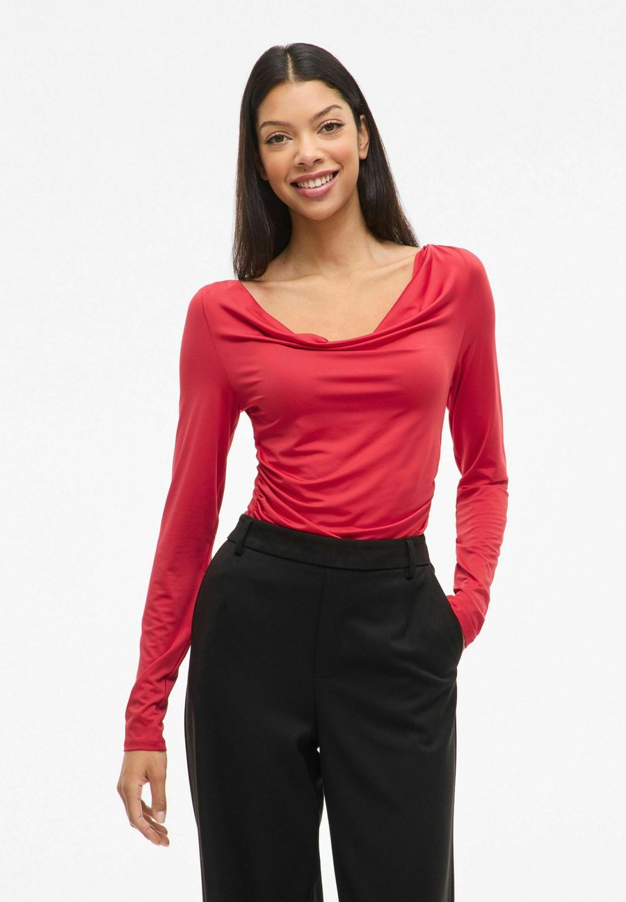 Топ VILA MIT LANGEN ÄRMELN VIKANA WASSERFALL-AUSSCHNITT, Racing Red/Mottled Red
Топ VILA MIT LANGEN ÄRMELN VIKANA WASSERFALL-AUSSCHNITT, Racing Red/Mottled Red