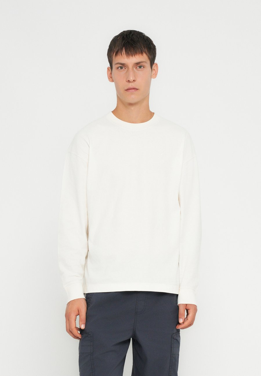 Топ Hollister Co. ICON TEE, Off White/Off-White
Топ Hollister Co. ICON TEE, Off White/Off-White