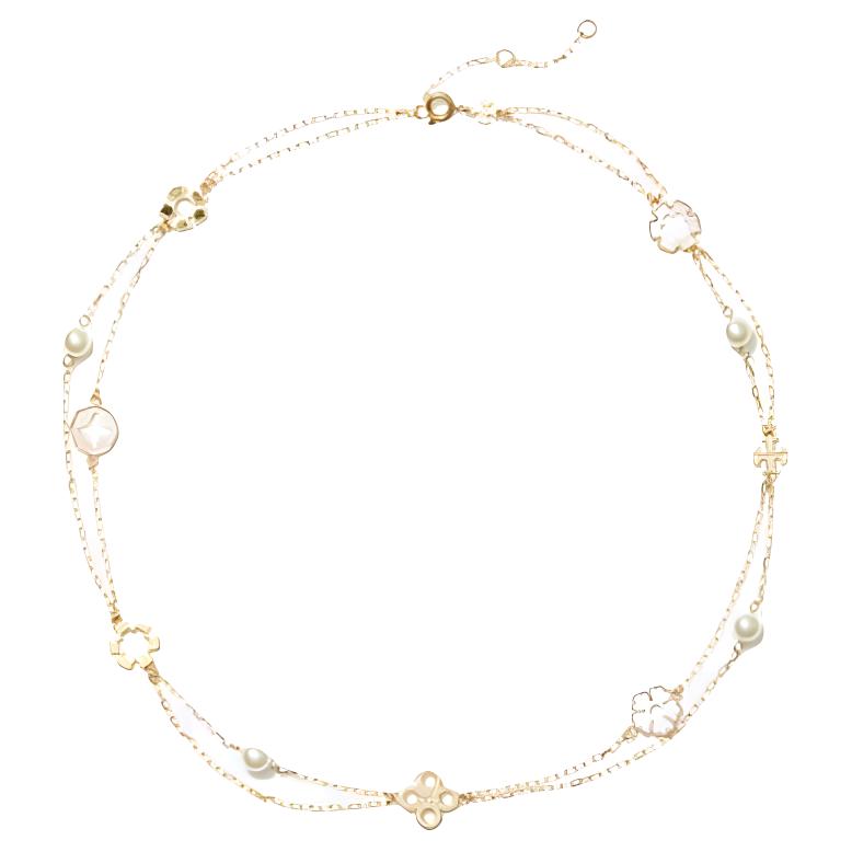 Тройное ожерелье с цветочными подвесками TORY BURCH
Тройное ожерелье с цветочными подвесками TORY BURCH