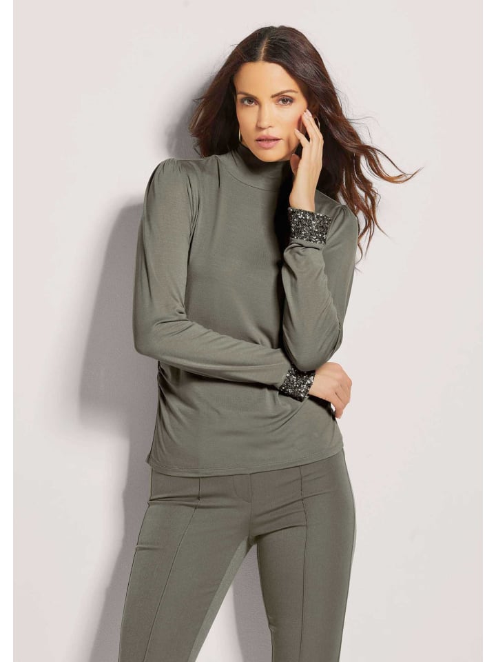 MADELEINE Элегантная футболка с длинными рукавами и воротником-стойкой из тростника
MADELEINE Элегантная футболка с длинными рукавами и воротником-стойкой из тростника