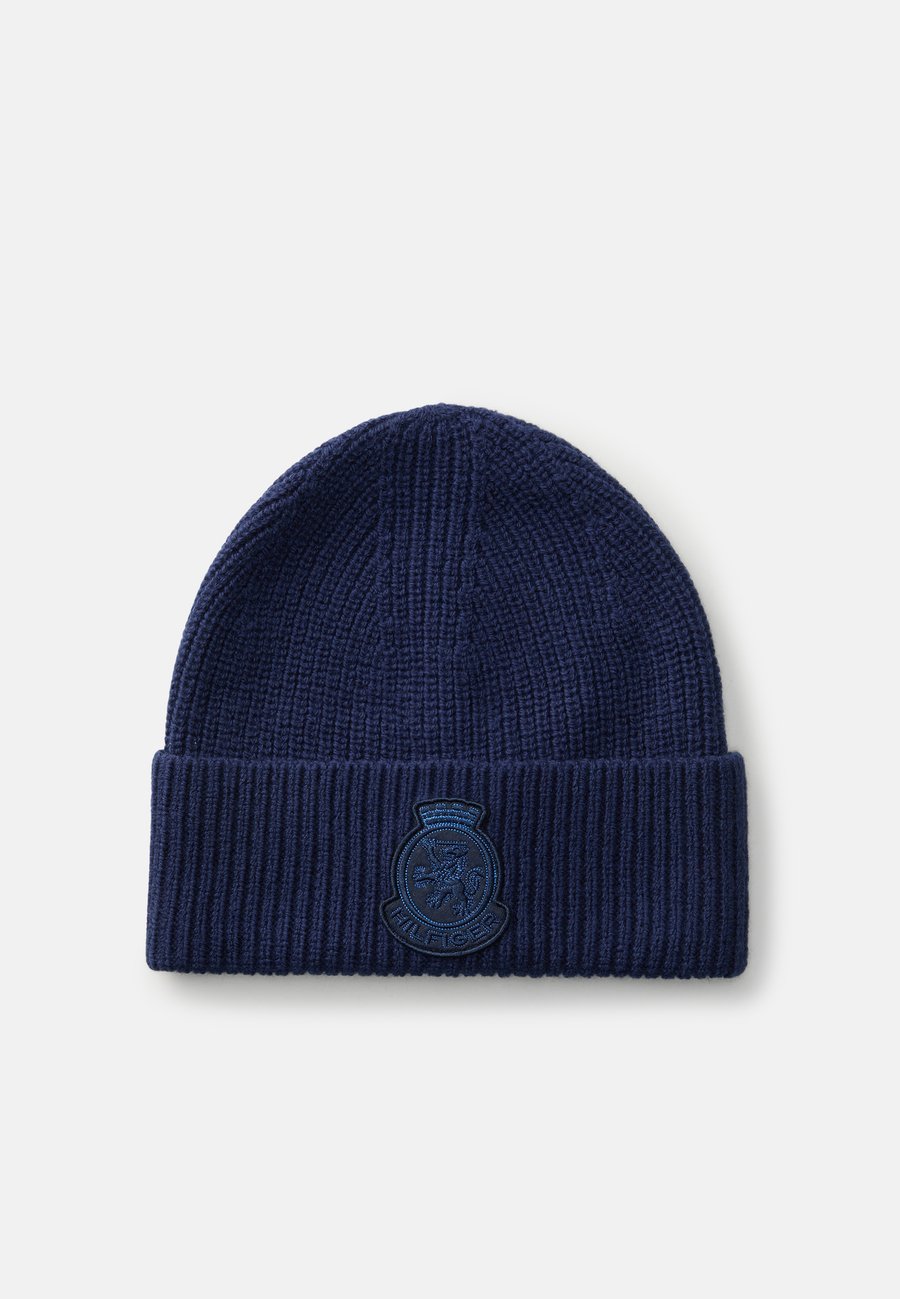Шапка Tommy Hilfiger CREST BEANIE UNISEX, Preppy Navy/Blue
Шапка Tommy Hilfiger CREST BEANIE UNISEX, Preppy Navy/Blue