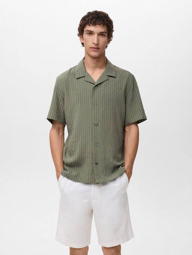 Пирео полосатая короткая рубашка с пуговицами Mango
Пирео полосатая короткая рубашка с пуговицами Mango