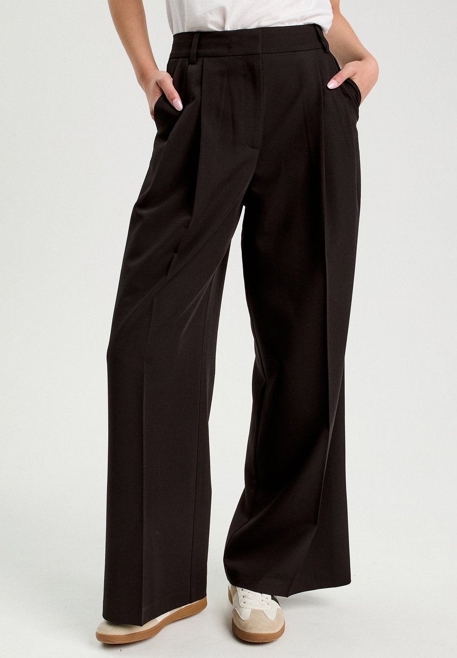 Брюки Cache Cache Trousers, Noir/Black
Брюки Cache Cache Trousers, Noir/Black