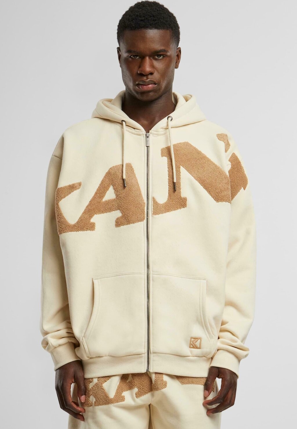 Толстовка на молнии Wavy Retro Karl Kani, кремовый цвет
Толстовка на молнии Wavy Retro Karl Kani, кремовый цвет