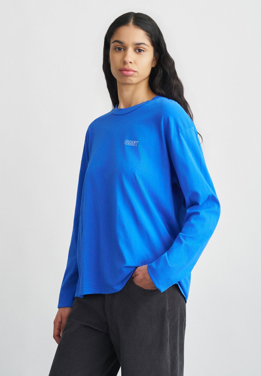 Топ Obey Clothing PERPETUAL MOVEMENT, Electric Indigo/Light Blue
Топ Obey Clothing PERPETUAL MOVEMENT, Electric Indigo/Light Blue