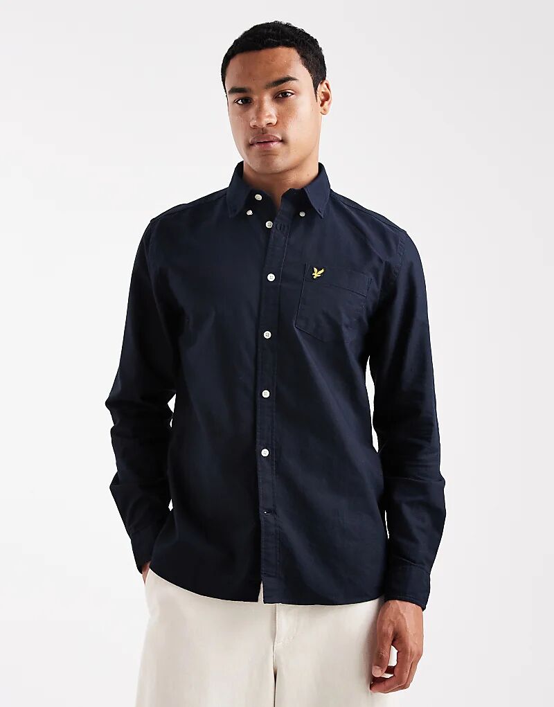 Рубашка оксфорд Lyle & Scott однотонная темно-синего цвета
Рубашка оксфорд Lyle & Scott однотонная темно-синего цвета