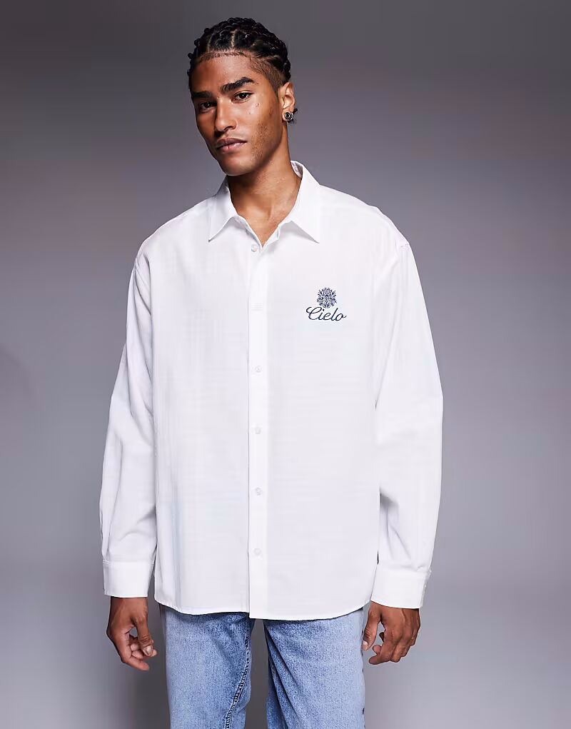 Рубашка свободного кроя белого цвета с вышивкой на груди Asos Design
Рубашка свободного кроя белого цвета с вышивкой на груди Asos Design