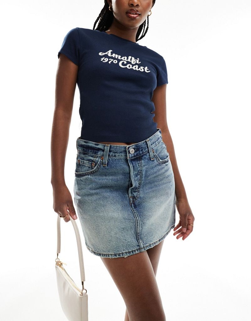 Голубая винтажная джинсовая юбка Levi's Icon
Голубая винтажная джинсовая юбка Levi's Icon