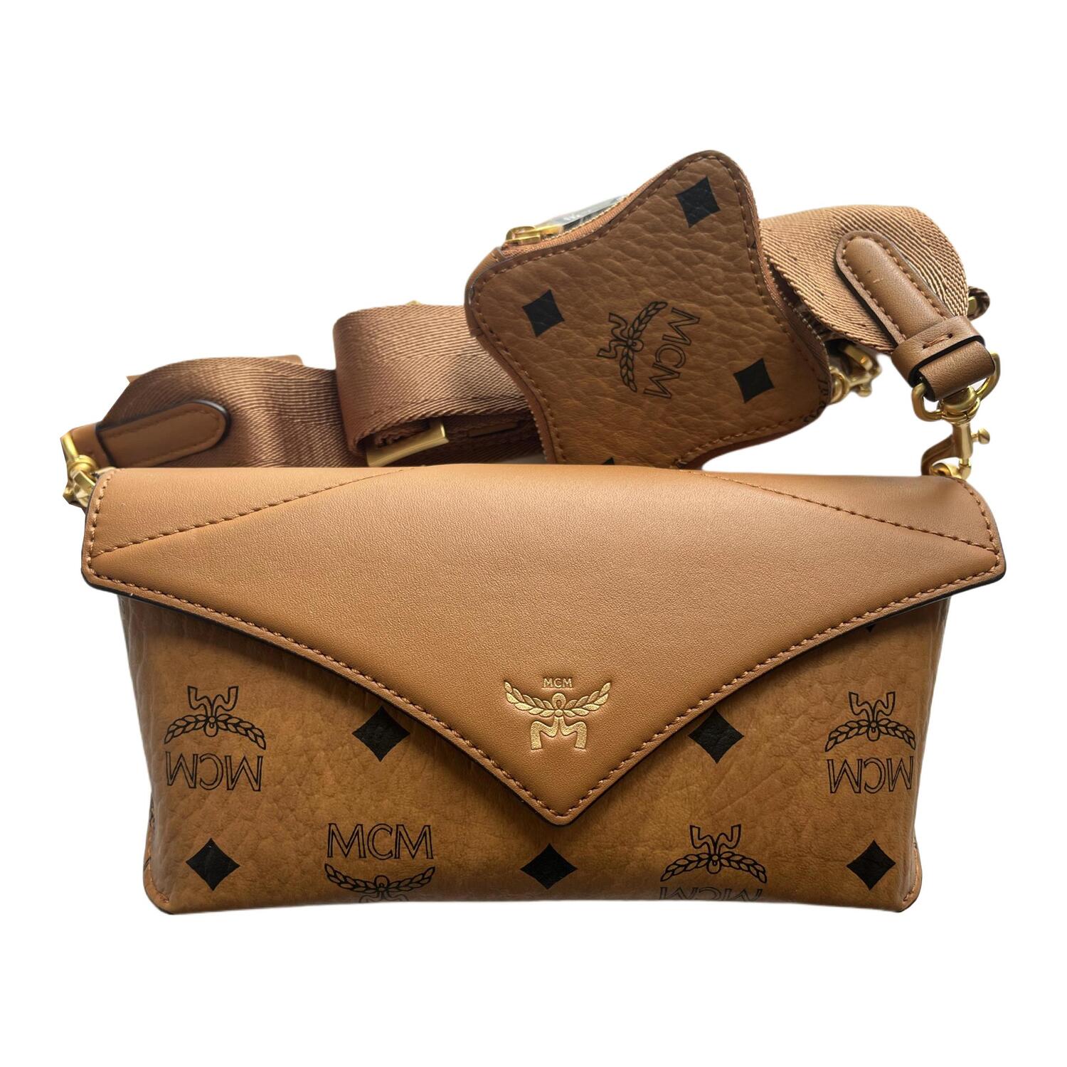 MCM Искусственная кожаная сумка через плечо унисекс коричневый коньяк
MCM Искусственная кожаная сумка через плечо унисекс коричневый коньяк