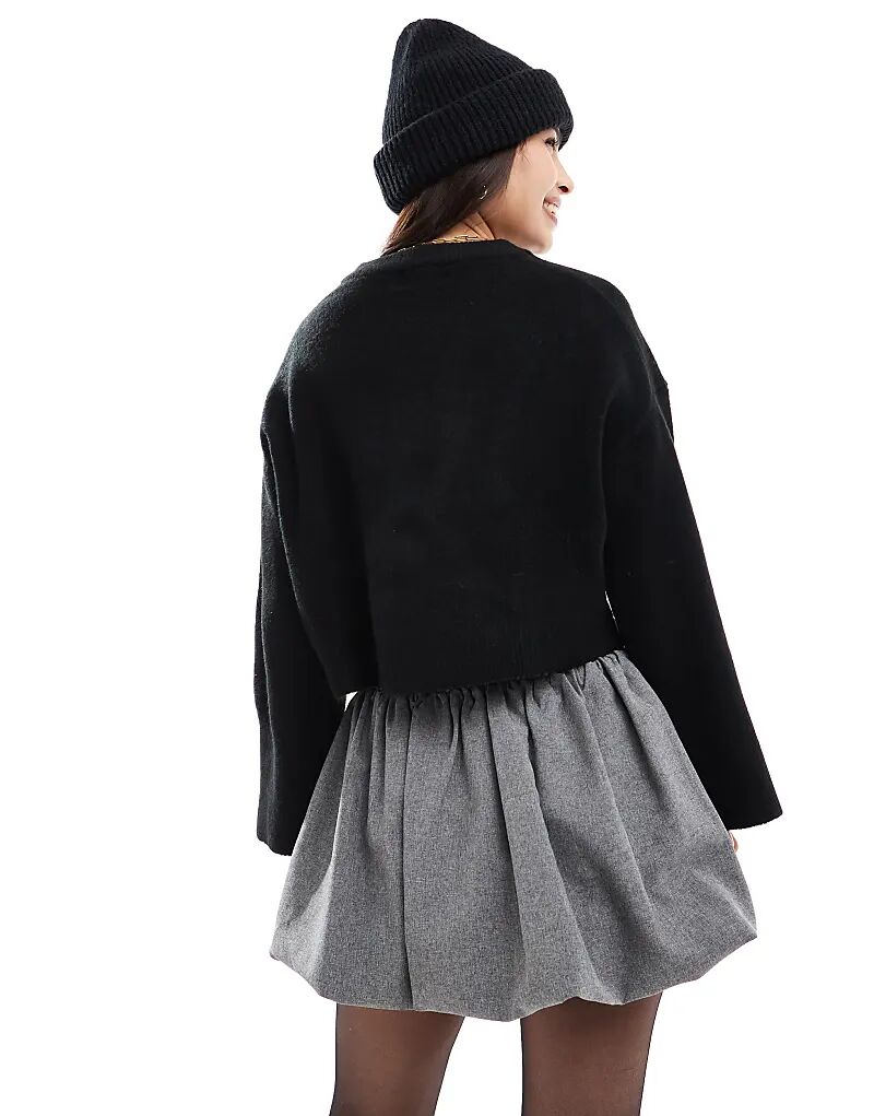 Джемпер свободного кроя с круглым вырезом и широкими манжетами ASOS DESIGN черного цвета
Джемпер свободного кроя с круглым вырезом и широкими манжетами ASOS DESIGN черного цвета