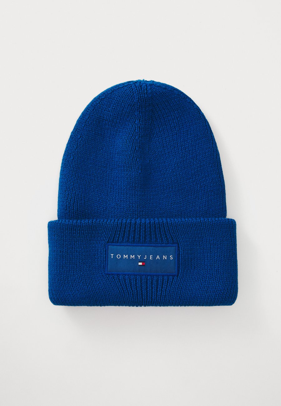Шапка Tommy Jeans LINEAR BEANIE UNISEX, Vibrant Indigo/Royal Blue
Шапка Tommy Jeans LINEAR BEANIE UNISEX, Vibrant Indigo/Royal Blue