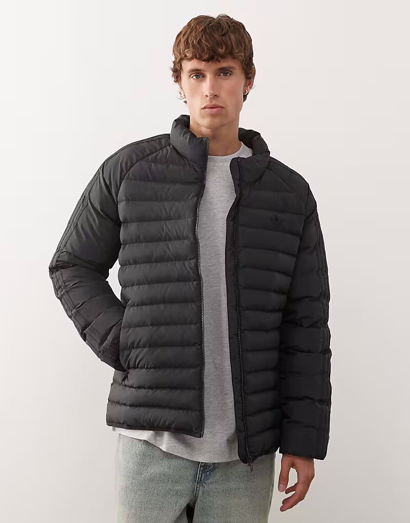 Куртка с утепленным воротником черного цвета Adidas Originals
Куртка с утепленным воротником черного цвета Adidas Originals