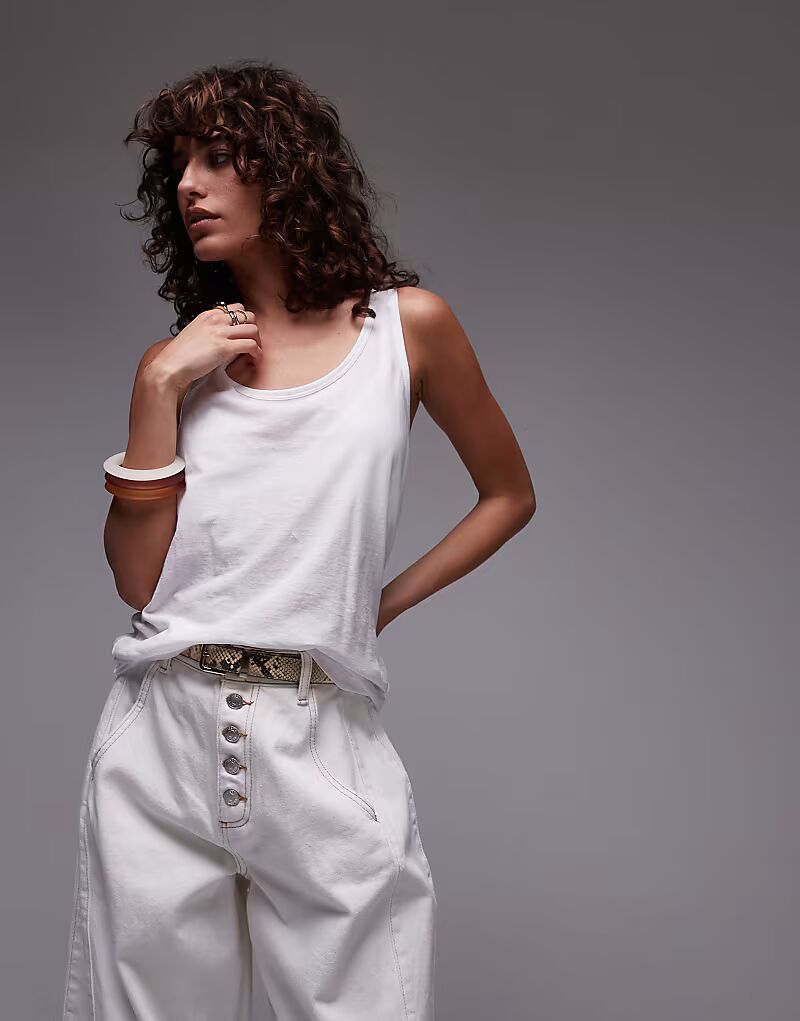 Легкий трикотажный топ ARKET белого цвета
Легкий трикотажный топ ARKET белого цвета