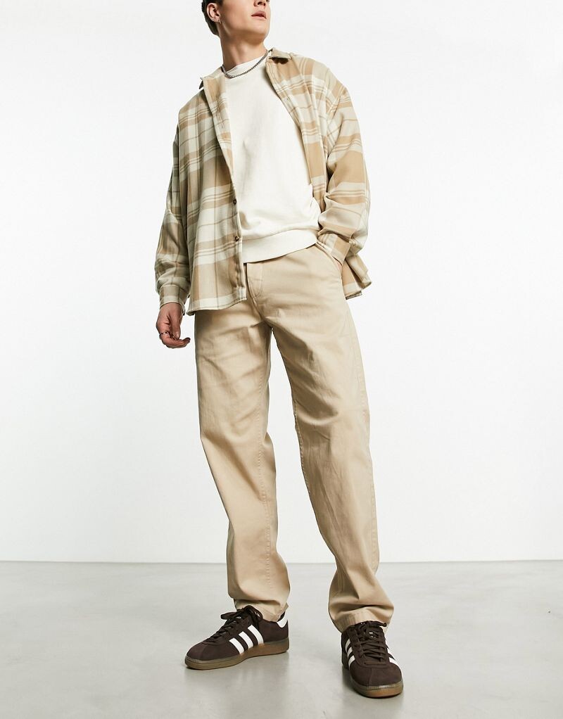 Бежевые брюки чинос свободного кроя Jack & Jones Intelligence Kane
Бежевые брюки чинос свободного кроя Jack & Jones Intelligence Kane