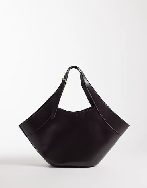 Большая сумка-ведро Mango шоколадного цвета
Большая сумка-ведро Mango шоколадного цвета