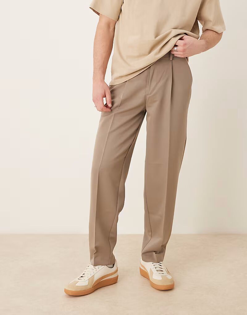 ASOS DESIGN элегантные зауженные брюки свободного кроя со складкой спереди в цвете темный камень
ASOS DESIGN элегантные зауженные брюки свободного кроя со складкой спереди в цвете темный камень