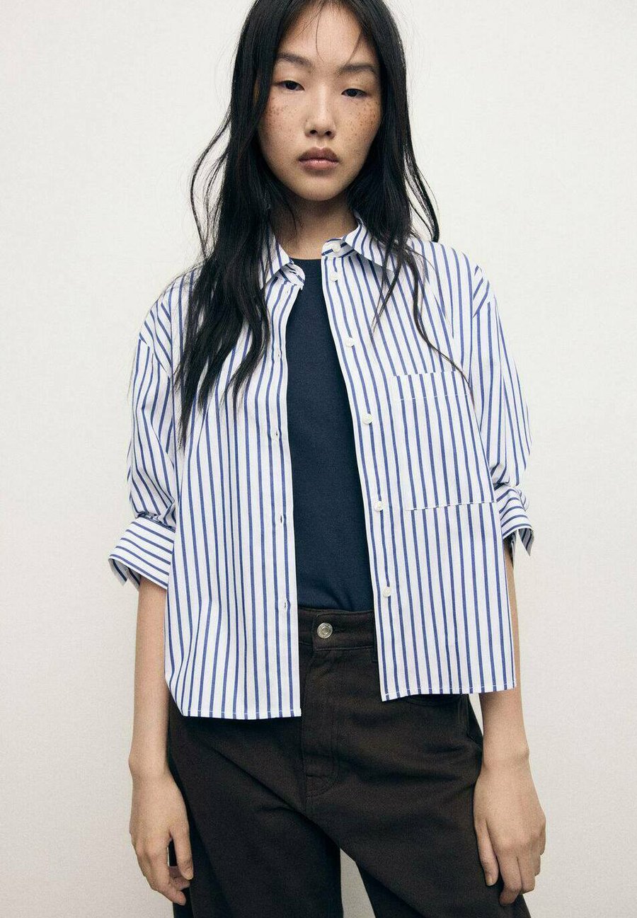 Блуза Mango Button-down blouse, Light Blue
Блуза Mango Button-down blouse, Light Blue