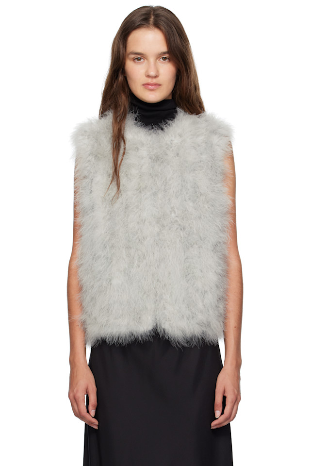 Yves Salomon Зеленый укороченный жилет из перьев
Yves Salomon Зеленый укороченный жилет из перьев