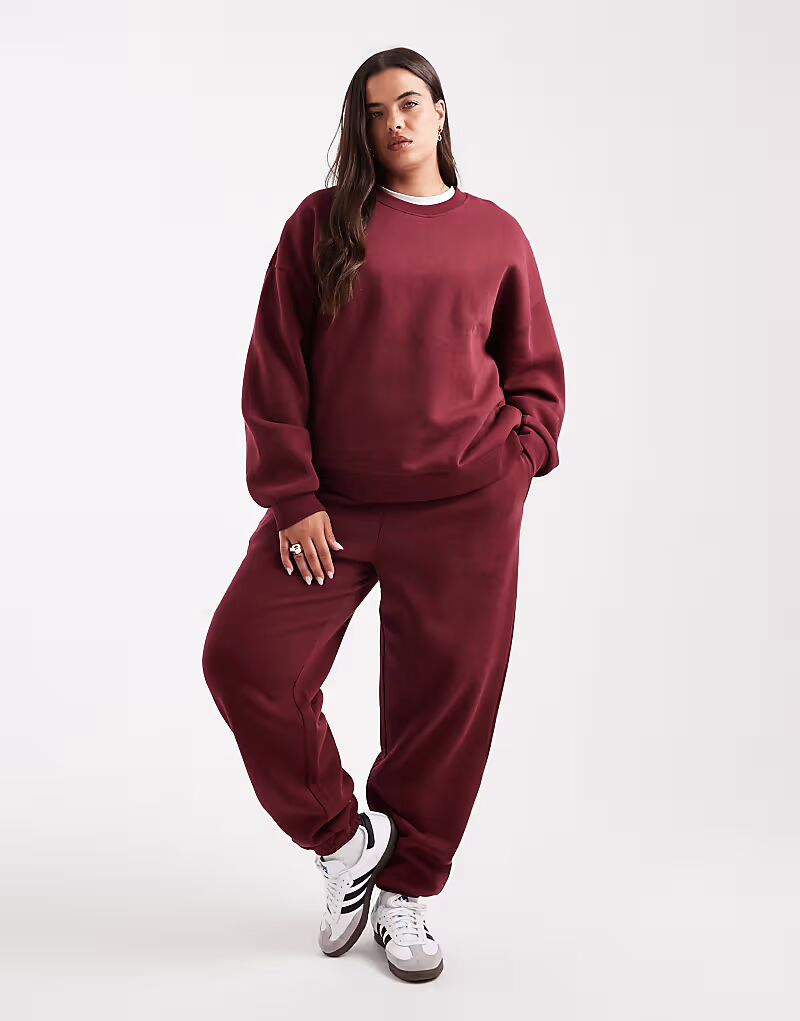 Спортивные брюки Curve Ultimate с манжетами и защипом ворса в бордовом цвете Asos Curve
Спортивные брюки Curve Ultimate с манжетами и защипом ворса в бордовом цвете Asos Curve