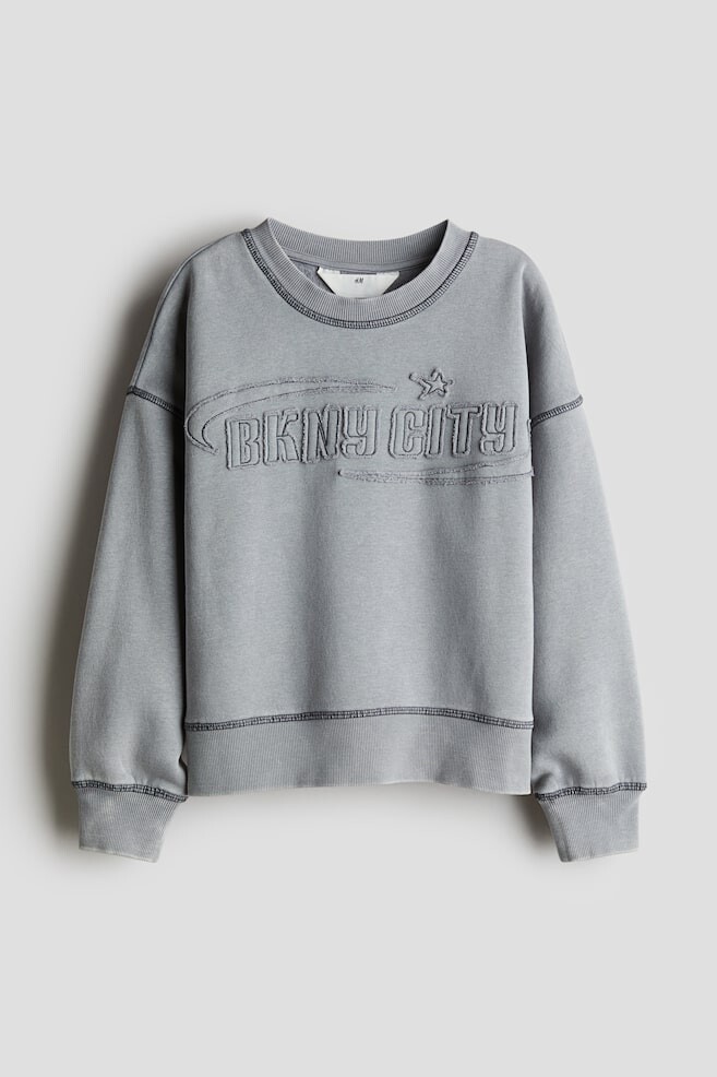 Толстовка с мотивом H&M, серый
Толстовка с мотивом H&M, серый