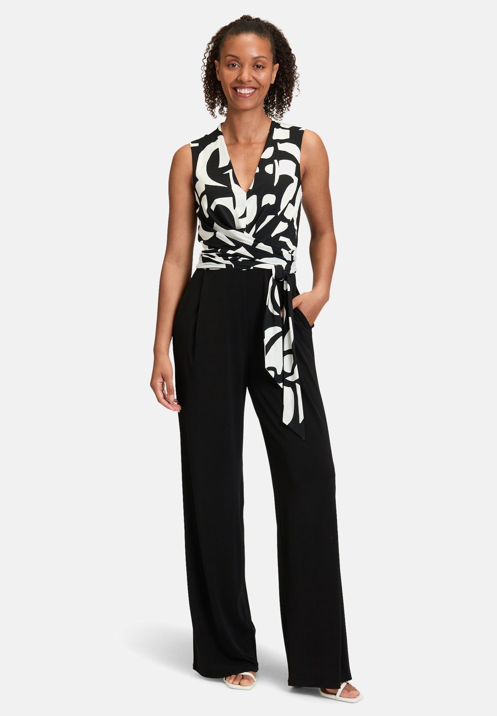 Комбинезон MIT BINDEGÜRTEL Vera Mont, черный
Комбинезон MIT BINDEGÜRTEL Vera Mont, черный