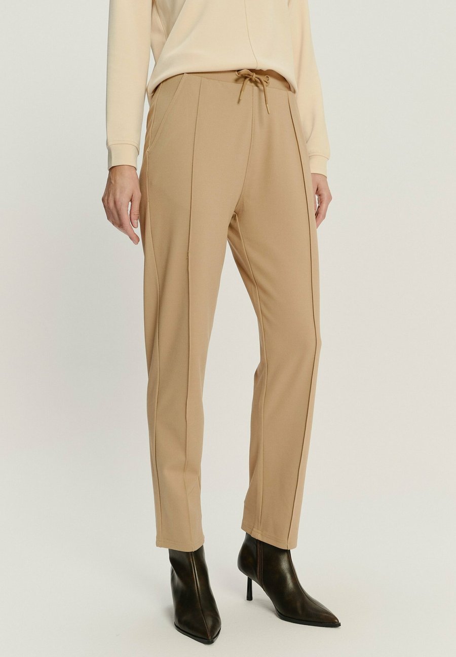 Брюки Greenpoint Trousers, Beige
Брюки Greenpoint Trousers, Beige