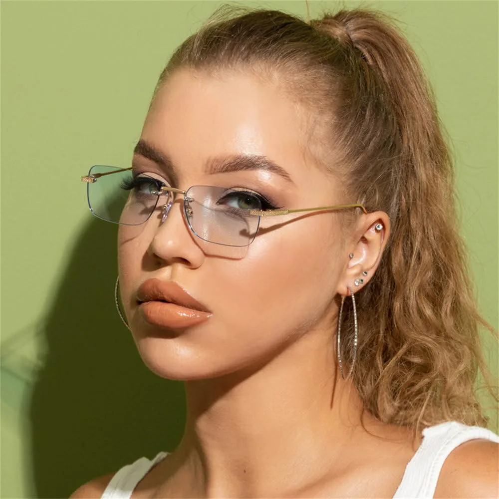 Женские солнцезащитные очки квадратной формы без оправы, маленькие прямоугольные солнцезащитные очки в винтажном стиле с тонированными цветными линзами PRSTNN, C3
Женские солнцезащитные очки квадратной формы без оправы, маленькие прямоугольные солнцезащитные очки в винтажном стиле с тонированными цветными линзами PRSTNN, C3