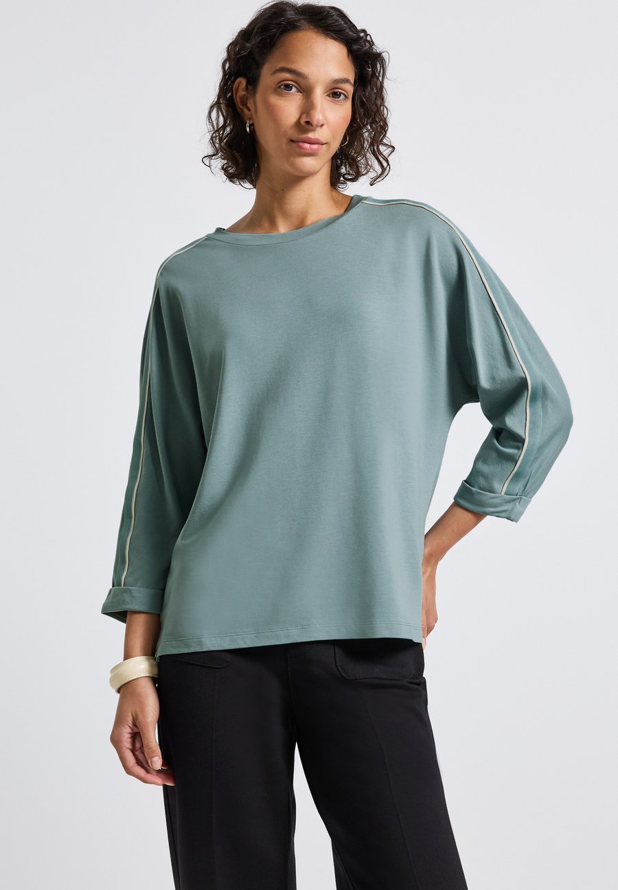 Топ Street One Long sleeved top, Blau/Light Blue
Топ Street One Long sleeved top, Blau/Light Blue