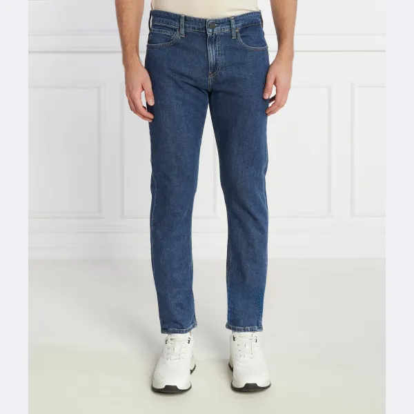 Джинсы узкого кроя средней длины синего цвета Calvin Klein, синий
Джинсы узкого кроя средней длины синего цвета Calvin Klein, синий