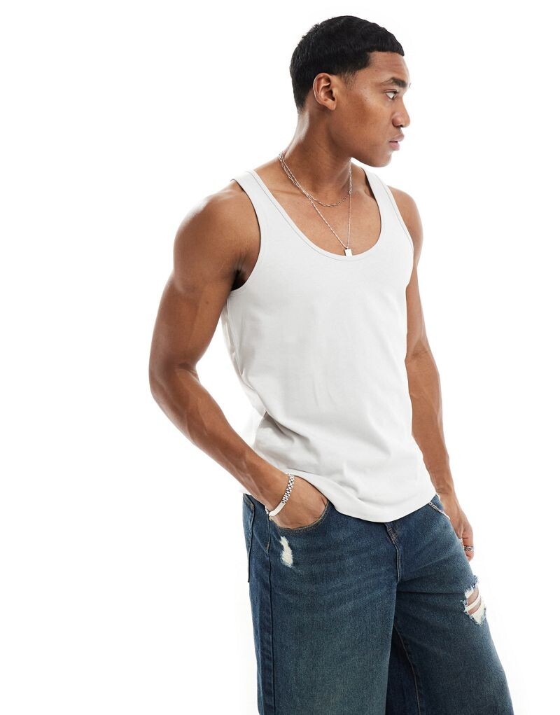 Светло-серая майка из плотной ткани ASOS DESIGN
Светло-серая майка из плотной ткани ASOS DESIGN