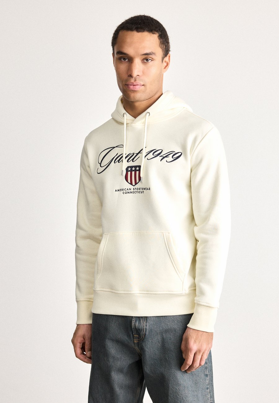Худи GANT GRAPHIC HOODIE, Cream/Off-White
Худи GANT GRAPHIC HOODIE, Cream/Off-White
