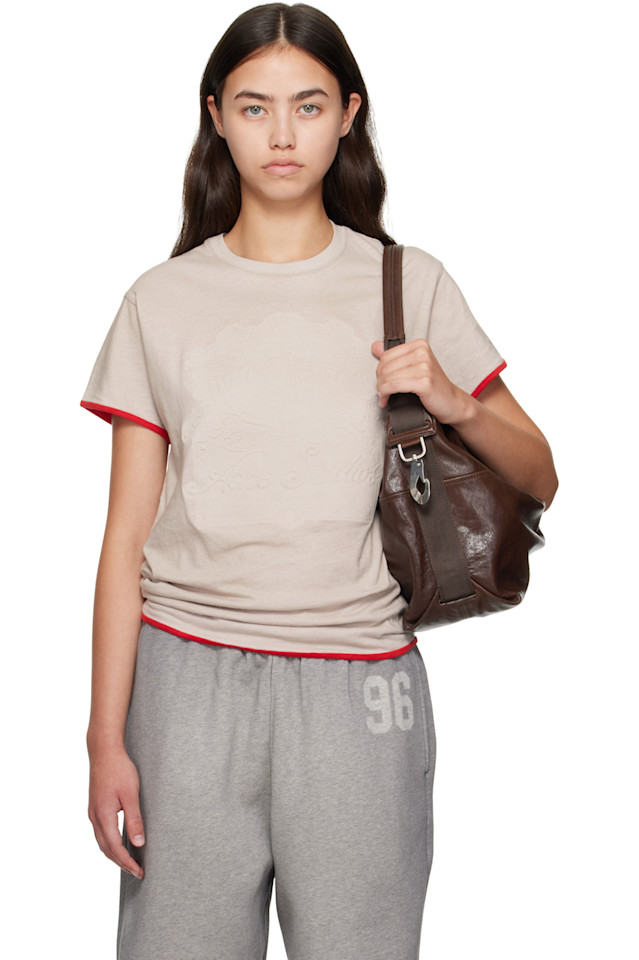 Acne Studios Футболка с рельефным логотипом бежевого и красного цвета
Acne Studios Футболка с рельефным логотипом бежевого и красного цвета