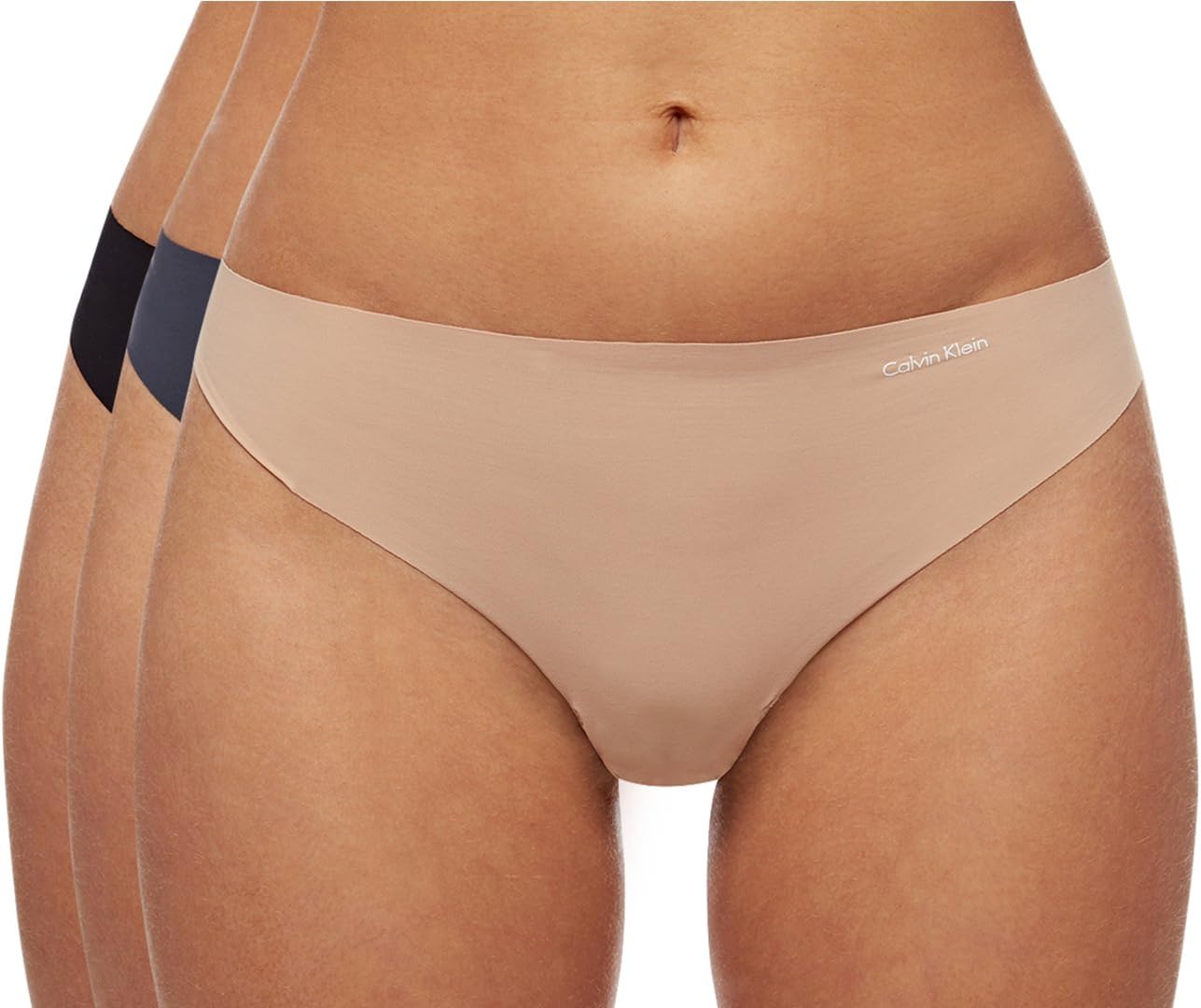 Комплект из 3 женских трусиков-стрингов Calvin Klein Invisibles, Speakeasy/Light Caramel/Black
Комплект из 3 женских трусиков-стрингов Calvin Klein Invisibles, Speakeasy/Light Caramel/Black