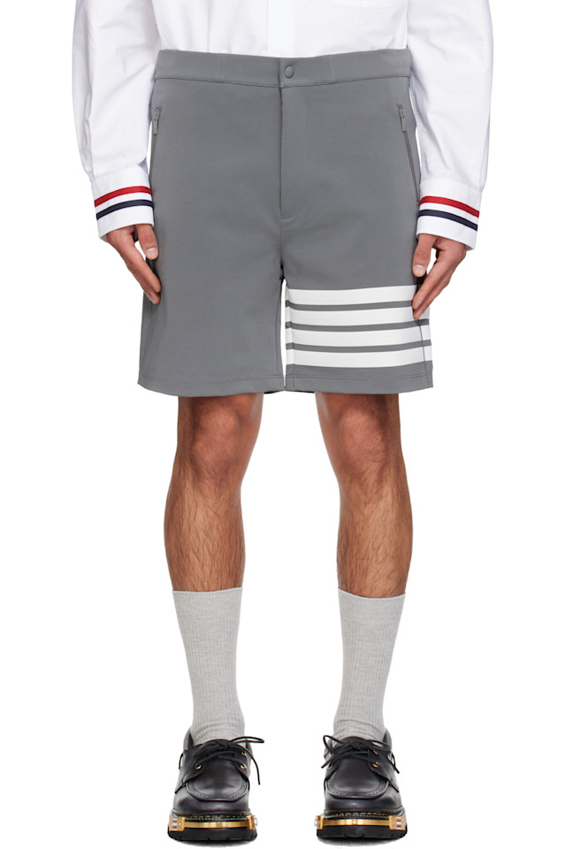 Thom Browne Серые технологичные шорты с четырьмя полосами
Thom Browne Серые технологичные шорты с четырьмя полосами