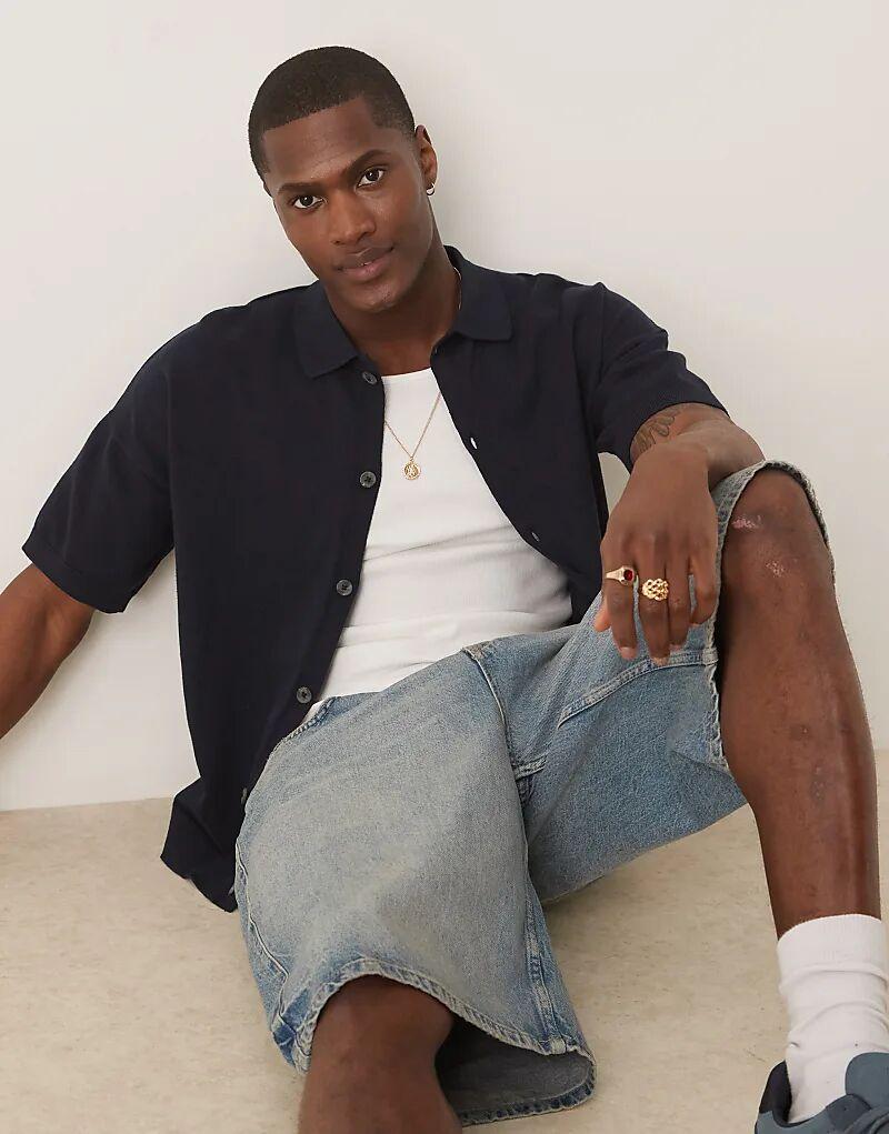 Свободное поло из легкого трикотажного хлопка на пуговицах темно-синего цвета ASOS DESIGN
Свободное поло из легкого трикотажного хлопка на пуговицах темно-синего цвета ASOS DESIGN