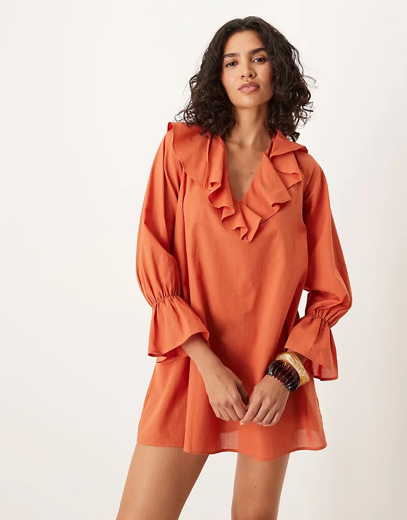 Мини-платье ASOS DESIGN с V-образным вырезом, длинными рукавами и оборками цвета ржавчины 
Мини-платье ASOS DESIGN с V-образным вырезом, длинными рукавами и оборками цвета ржавчины