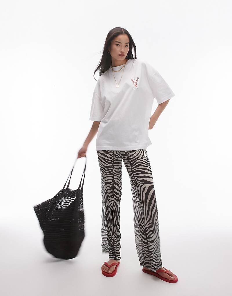 Topshop = Прозрачные брюки черно-белого цвета = с абстрактным узором и жатой структурой
Topshop = Прозрачные брюки черно-белого цвета = с абстрактным узором и жатой структурой