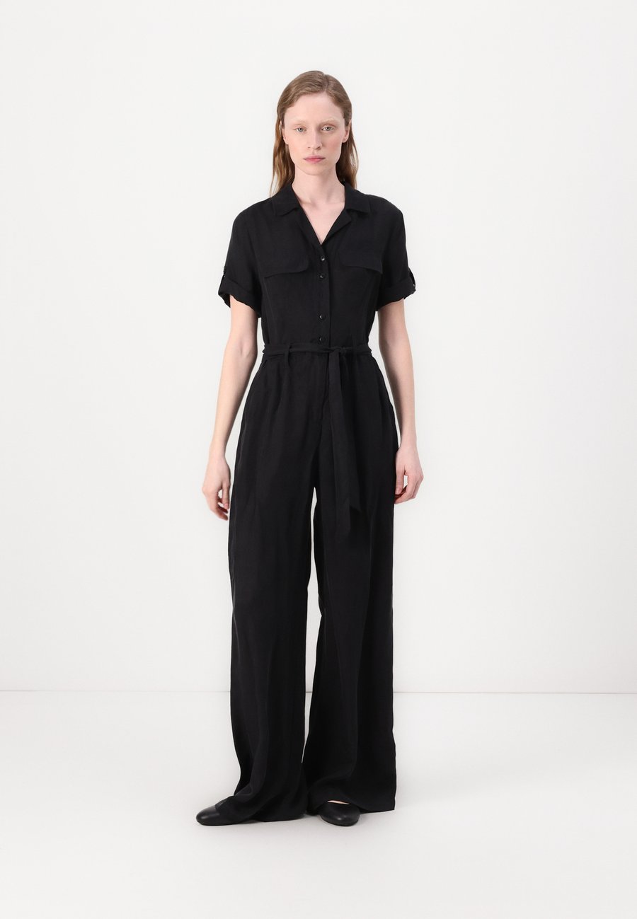 Комбинезон Guess NALINI , Jet Black/Black
Комбинезон Guess NALINI , Jet Black/Black