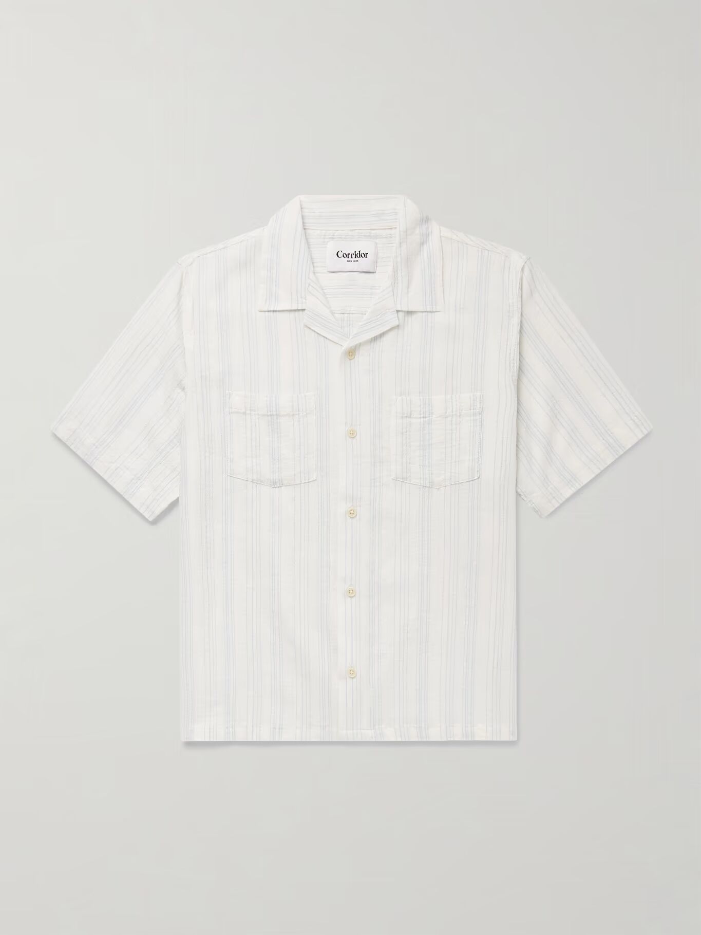 Рубашка Skip Camp-Collar из хлопчатобумажной марли в полоску CORRIDOR, белый
Рубашка Skip Camp-Collar из хлопчатобумажной марли в полоску CORRIDOR, белый