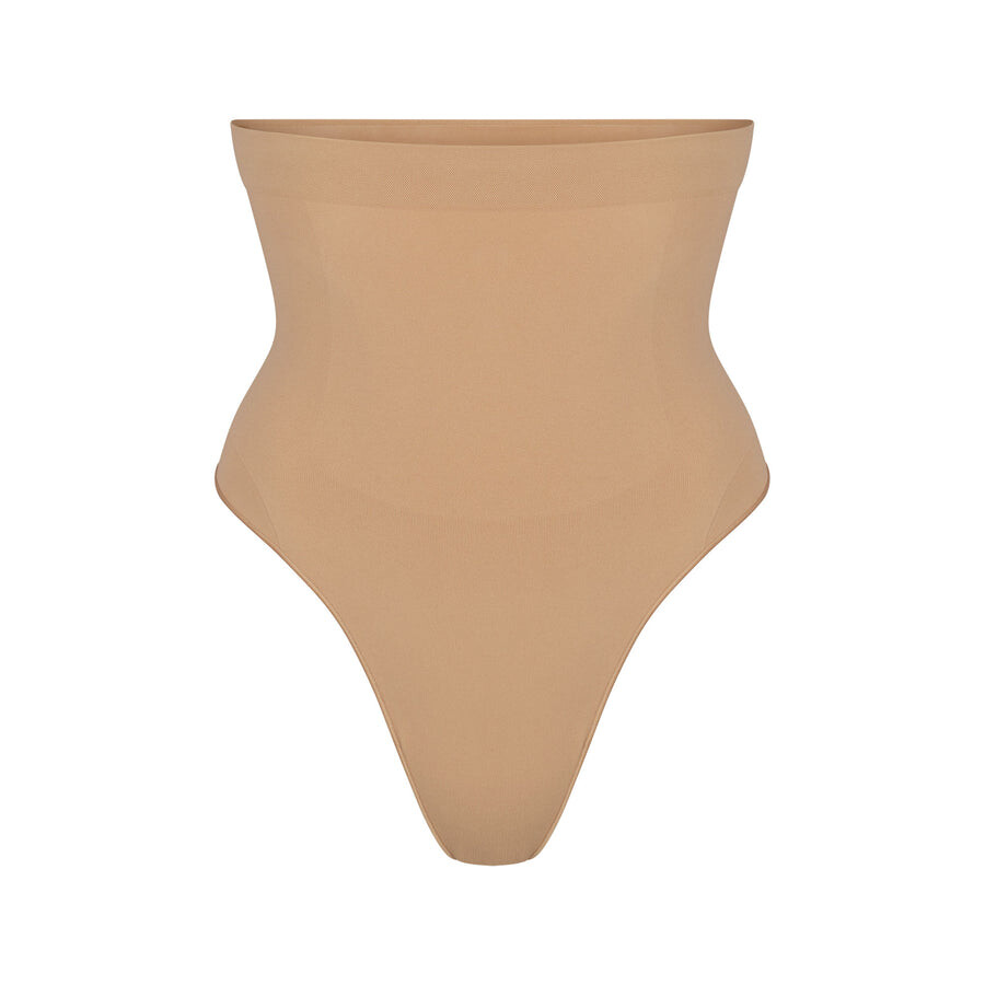Стринги с высокой талией SKIMS Seamless Sculpt, охра
Стринги с высокой талией SKIMS Seamless Sculpt, охра