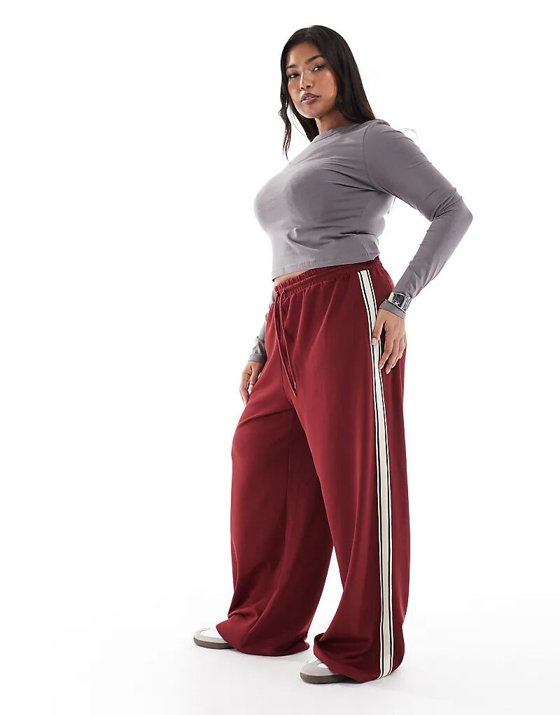 Широкие брюки ONLY Curve с контрастными вставками бордового цвета
Широкие брюки ONLY Curve с контрастными вставками бордового цвета