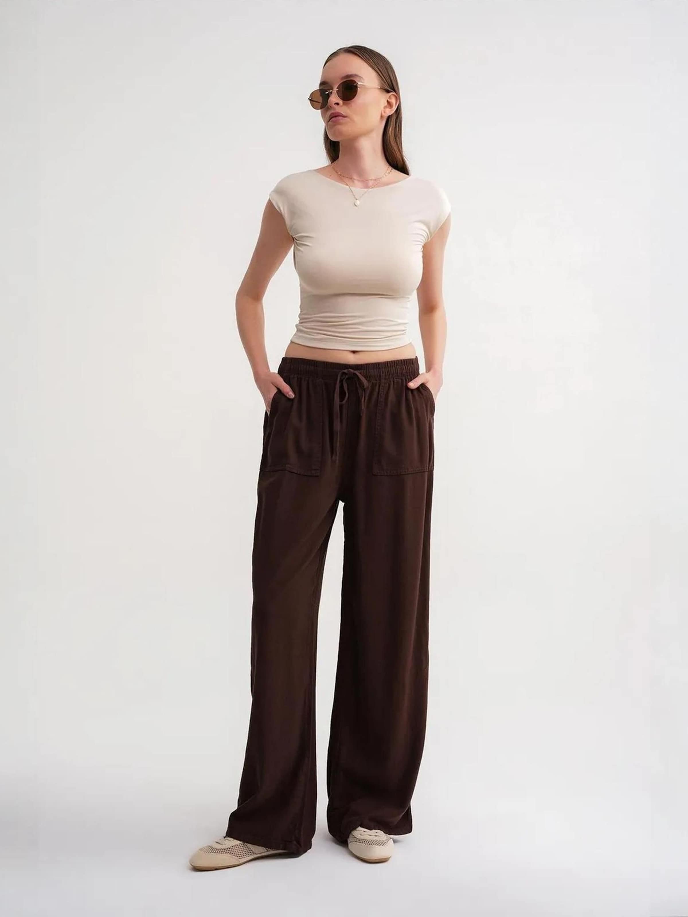 MixRay Широкие брюки в коричневом цвете
MixRay Широкие брюки в коричневом цвете