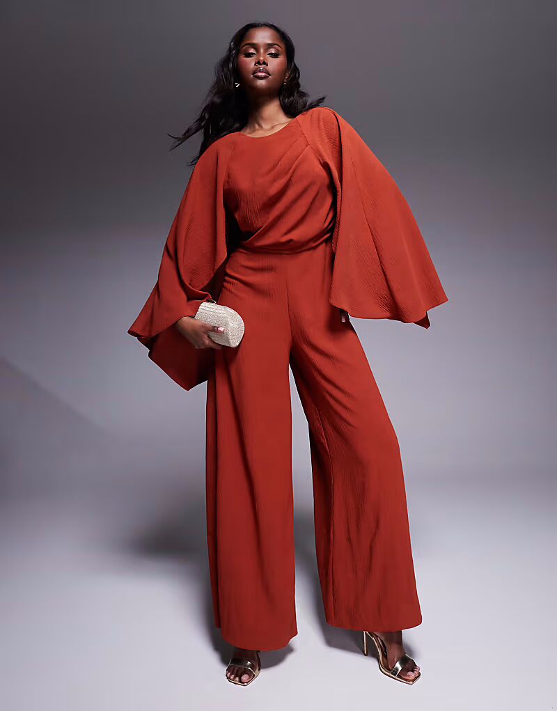 Широкий комбинезон ASOS DESIGN цвета ржавчины с открытой спиной и накидкой
Широкий комбинезон ASOS DESIGN цвета ржавчины с открытой спиной и накидкой