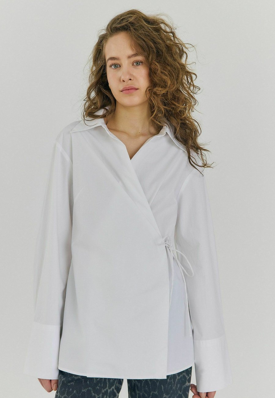 Блуза NORR FRASER WRAP, White
Блуза NORR FRASER WRAP, White