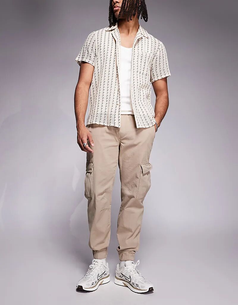 Брюки-карго Bershka с манжетами цвета «камень»
Брюки-карго Bershka с манжетами цвета «камень»