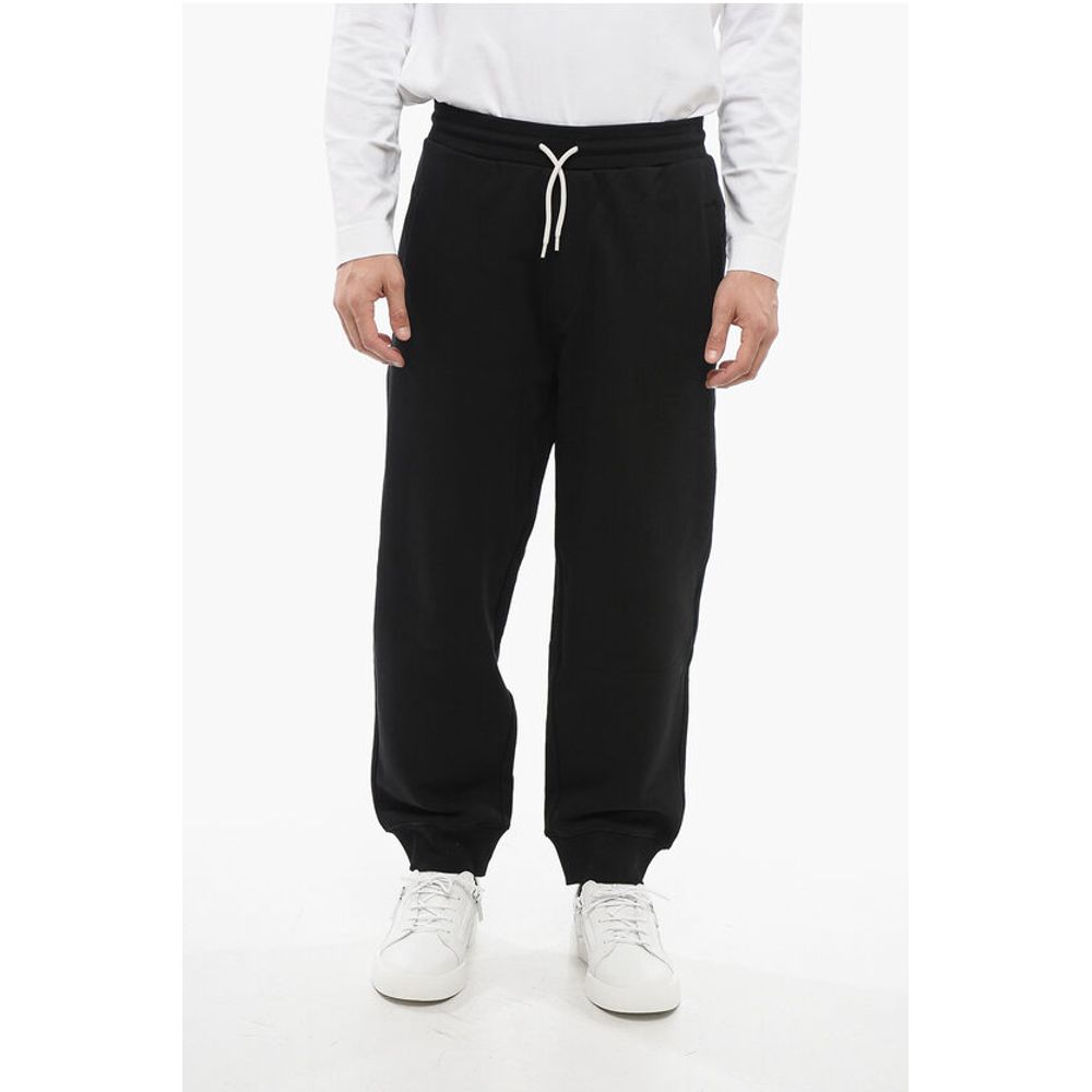 Спортивные брюки EMPORIO из начесаного хлопка с манжетами Armani, Black
Спортивные брюки EMPORIO из начесаного хлопка с манжетами Armani, Black