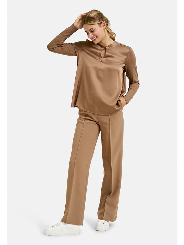 Milano Italy Светло-коричневая блузка
Milano Italy Светло-коричневая блузка